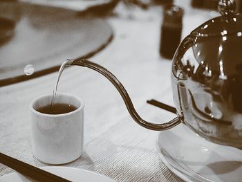 Close-up of coffee cup on table