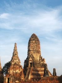 Low angle view of old temple building against sky