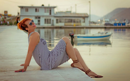 Portrait of young woman in water