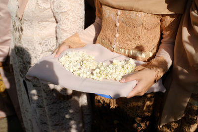 Midsection of woman preparing food