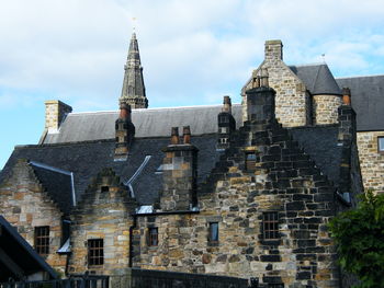 Low angle view of old building against sky