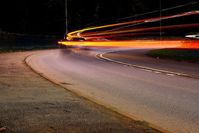 Light trails on road at night