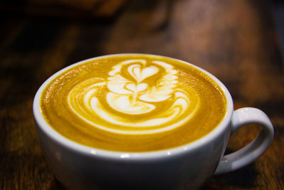 Close-up of cappuccino on table