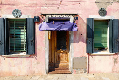 Clothes drying on old building