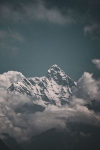 Scenic view of snowcapped mountains against sky during sunset