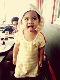 Portrait of cute girl holding ice cream