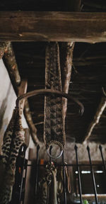 Close-up of rusty tied up on metal