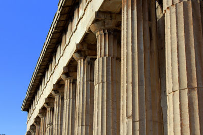 Columns at historic building against sky