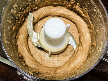 High angle view of peanut butter in food processor 