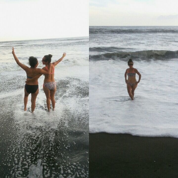 TWO PEOPLE ENJOYING AT BEACH