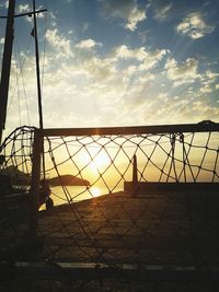 Silhouette of bridge against sky during sunset