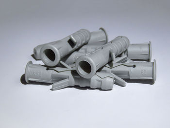 Close-up of telephone booth against white background