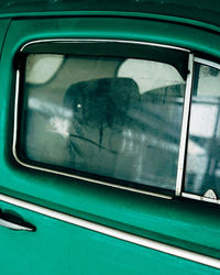 Reflection of car on side-view mirror