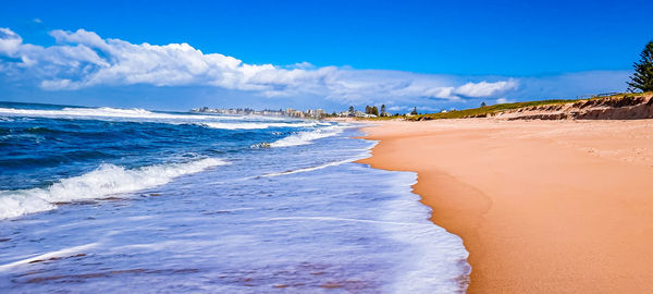 Panoramic view of beach against sky