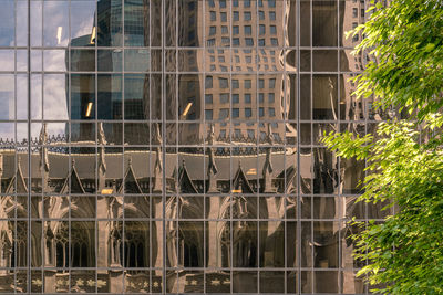 Buildings seen through glass window