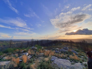 Scenic view of landscape against sky during sunset