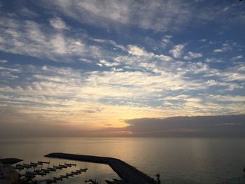 Scenic view of sea against dramatic sky