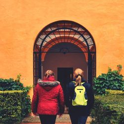 Woman standing in tunnel