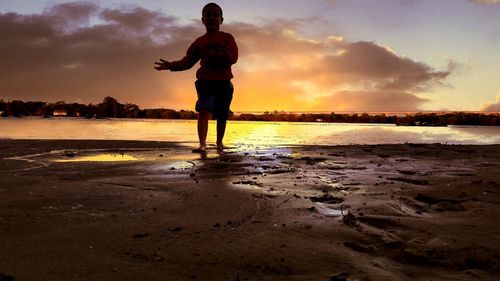 Scenic view of sea at sunset