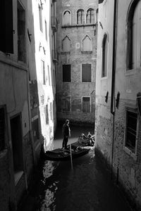 Man in front of building