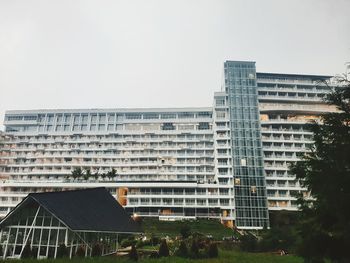 Low angle view of modern buildings against clear sky