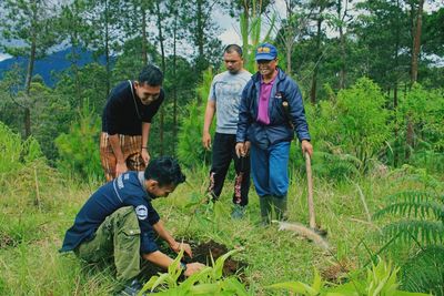 Men in forest