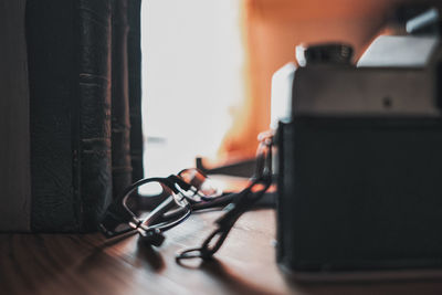 Close-up of eyeglasses on table at home