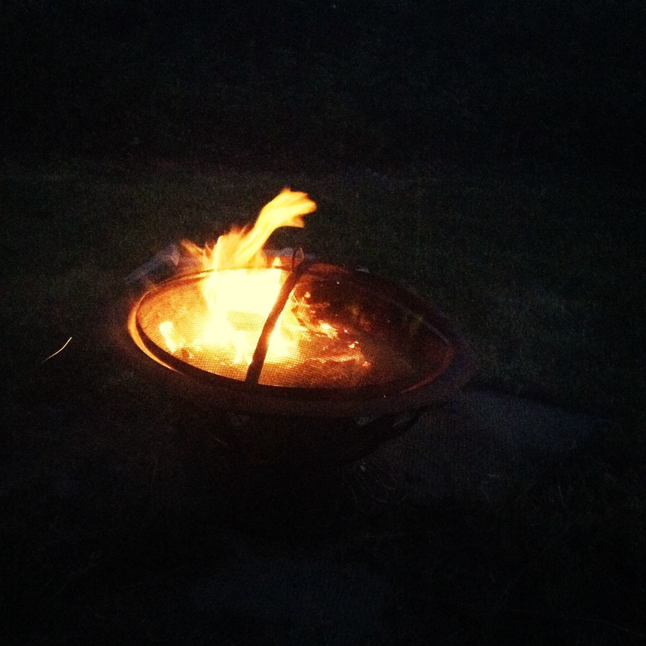 flame, burning, fire - natural phenomenon, heat - temperature, glowing, fire, illuminated, night, candle, lit, dark, heat, close-up, bonfire, indoors, black background, copy space, light - natural phenomenon, orange color, firewood