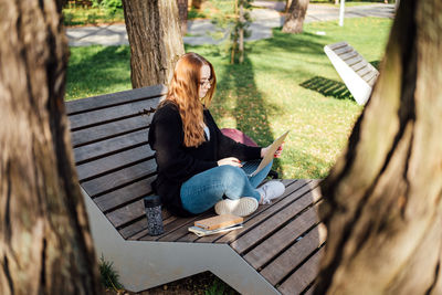 Mental health. work-life balance, online work job or education. redhead woman working typing on