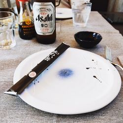 High angle view of wine in glass on table