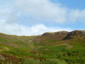 View of landscape against cloudy sky