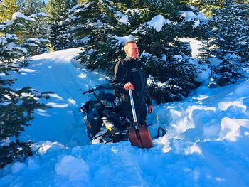 Man with umbrella in snow