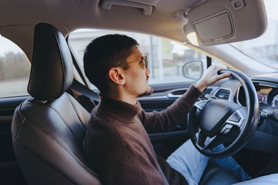 Man driving car