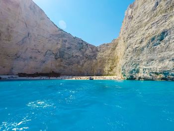 Scenic view of sea against blue sky