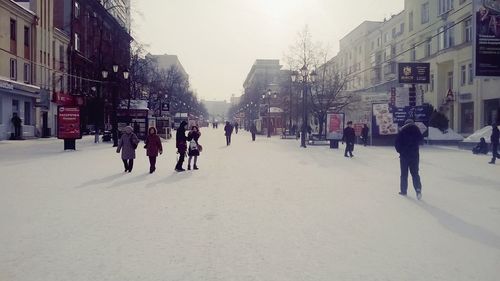 People walking on city street