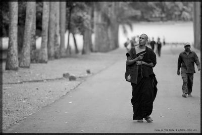 Women walking on road