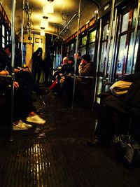 Man traveling in bus at night