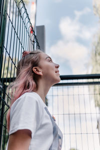 Portrait of young woman looking away