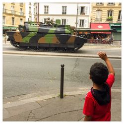 Boy playing on street