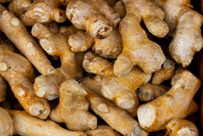 A pile of freshly cut ginger root for sale 