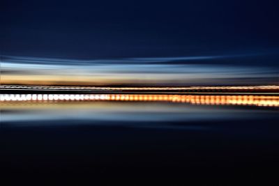 Scenic view of sea against sky at night