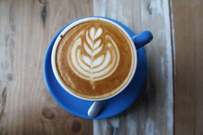 High angle view of cappuccino on table