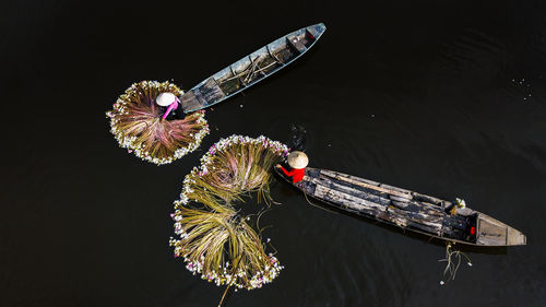 High angle view of people on lake