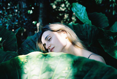 Portrait of a young woman with eyes closed