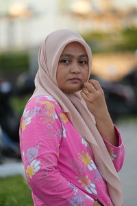 Portrait of young woman wearing hijab