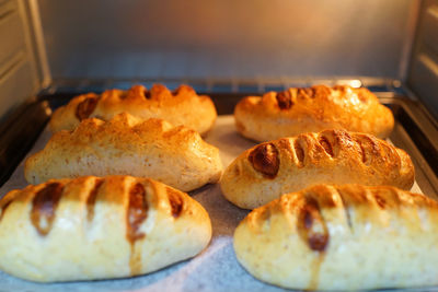 Bun pastries being baked in oven