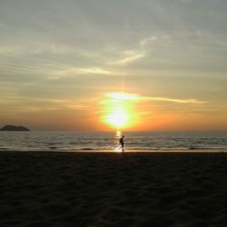 Scenic view of sea at sunset