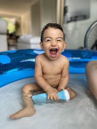 Hapiness of a baby swimming in pool