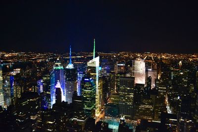 Illuminated cityscape at night
