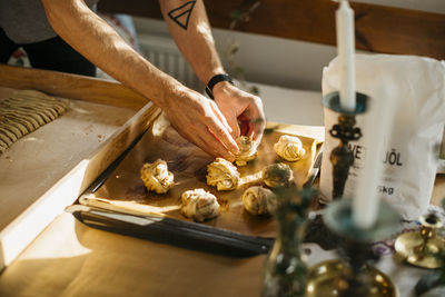 Preparing cinnamon buns